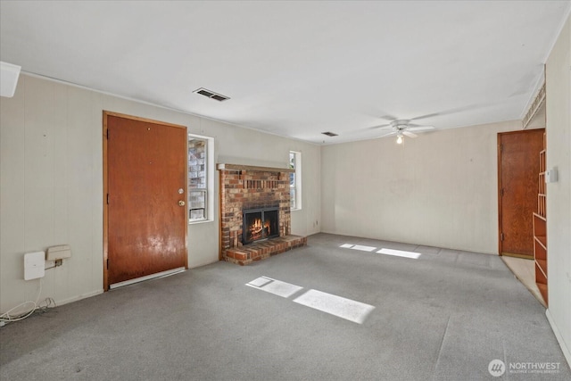 22907 60th Ave W, Mountlake Terrace, WA 98043 - unfurnished living room with carpet flooring, a ceiling fan, and a brick fireplace