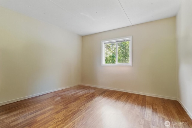 17913 51st St NW, Vaughn, WA 98394 - unfurnished room featuring light wood-style flooring and baseboards