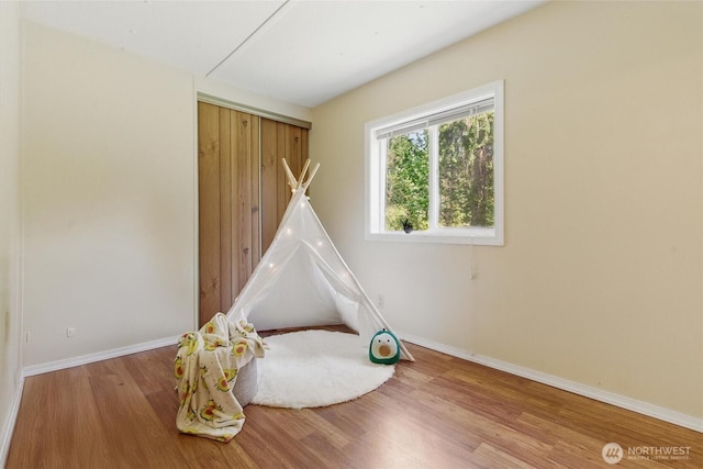 17913 51st St NW, Vaughn, WA 98394 - playroom with wood finished floors and baseboards