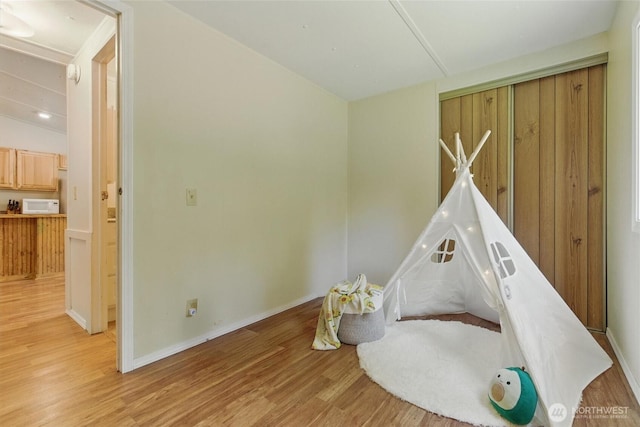 17913 51st St NW, Vaughn, WA 98394 - recreation room with light wood-type flooring and baseboards