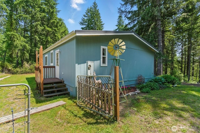17913 51st St NW, Vaughn, WA 98394 - view of property exterior with a lawn
