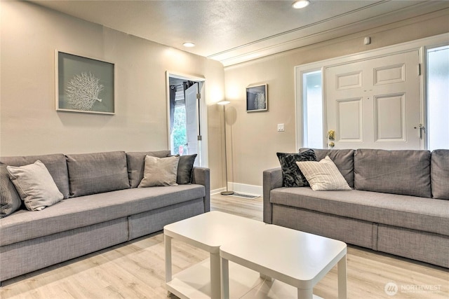 1934 NE Northgate Way, Seattle, WA 98125 - living area with light wood-style floors, plenty of natural light, and recessed lighting