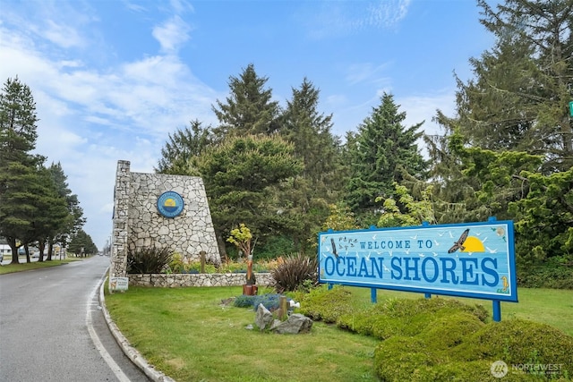 473 Mt Olympus Ave SE, Ocean Shores, WA 98569 - view of community with a yard