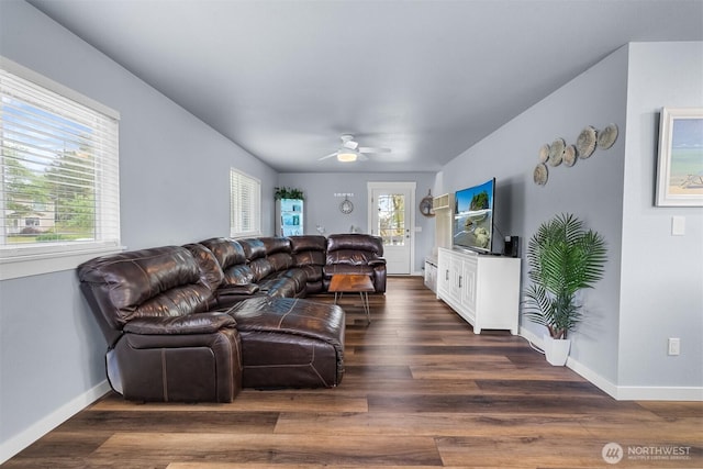 473 Mt Olympus Ave SE, Ocean Shores, WA 98569 - living area with ceiling fan, wood finished floors, and baseboards