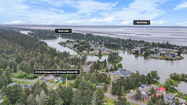 473 Mt Olympus Ave SE, Ocean Shores, WA 98569 - aerial view of property and surrounding area with a nearby body of water and nearby suburban area