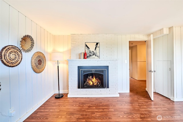 12747 9th Ave NW, Seattle, WA 98177 - living area with wood finished floors and a brick fireplace