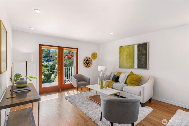 7503 24th Ave NE, Seattle, WA 98115 - living area featuring wood-type flooring, recessed lighting, french doors, and baseboards