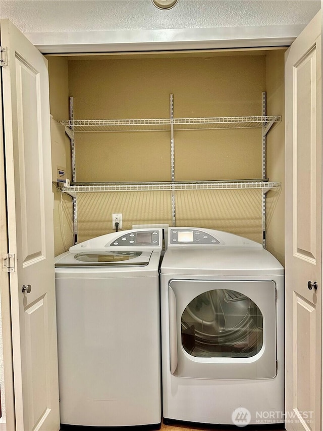 11054 NE 33rd Pl Unit B1, Bellevue, WA 98004 - washroom with washing machine and dryer