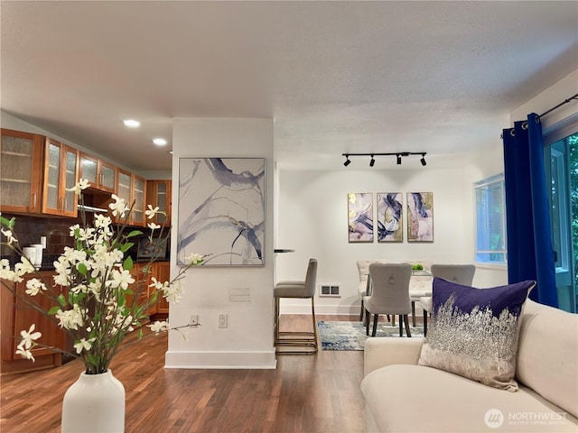 11054 NE 33rd Pl Unit B1, Bellevue, WA 98004 - living area with baseboards, wood finished floors, and recessed lighting