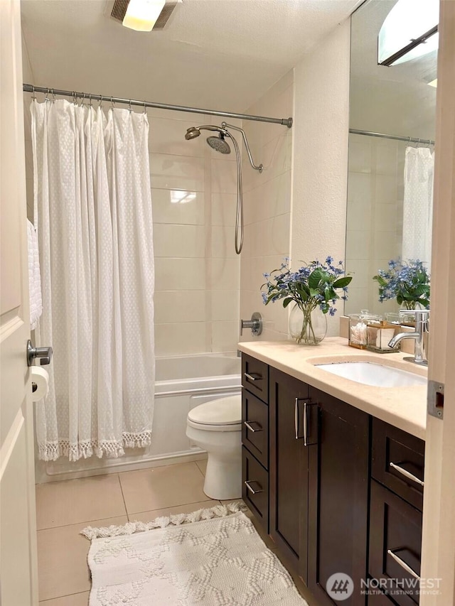 11054 NE 33rd Pl Unit B1, Bellevue, WA 98004 - full bath featuring tile patterned flooring, vanity, and shower / bath combo with shower curtain