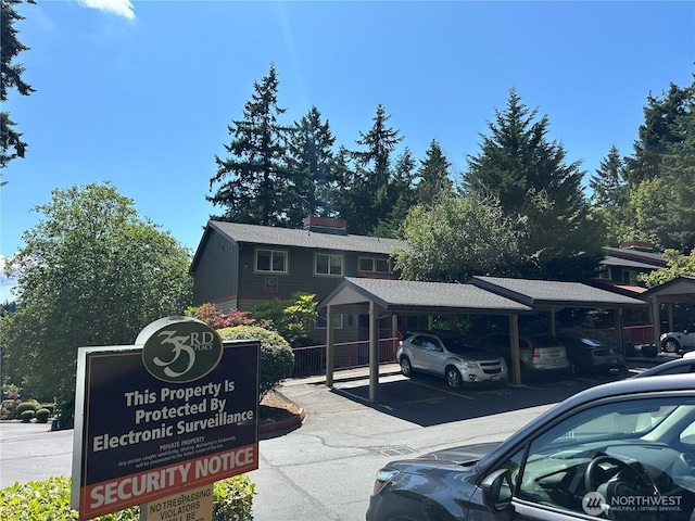11054 NE 33rd Pl Unit B1, Bellevue, WA 98004 - view of partially covered parking lot