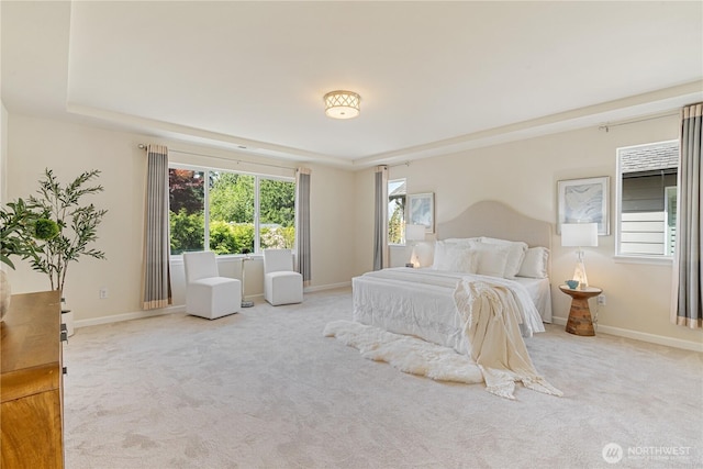 bedroom with carpet and baseboards