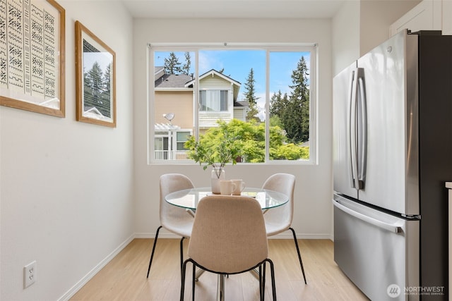 16318 119th Ln NE, Bothell, WA 98011 - dining area featuring light wood-style flooring and baseboards