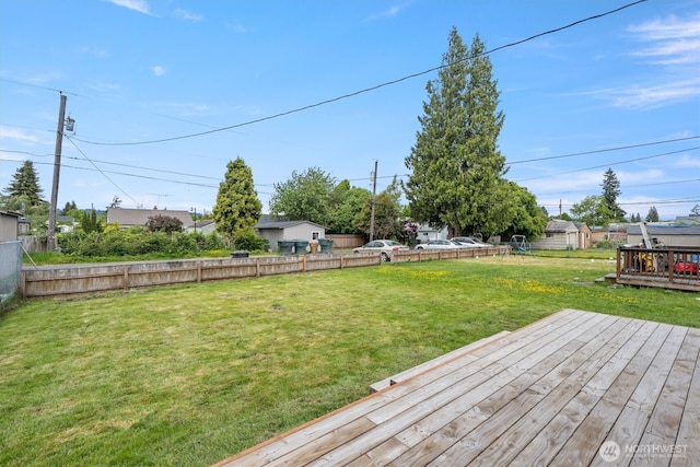 view of yard featuring a wooden deck