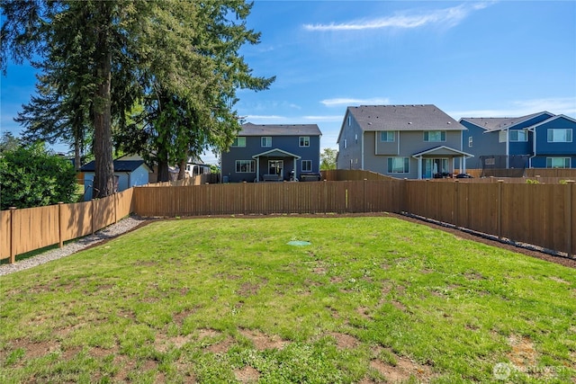 view of yard featuring a residential view