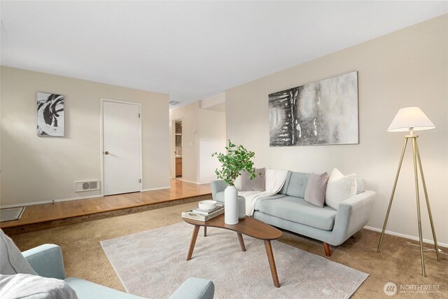 707 Harvest Rd, Bothell, WA 98012 - carpeted living room featuring baseboards