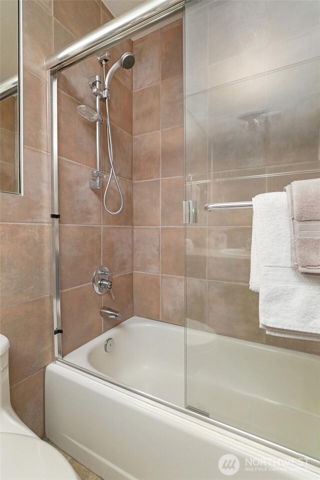 707 Harvest Rd, Bothell, WA 98012 - bathroom with bath / shower combo with glass door and toilet