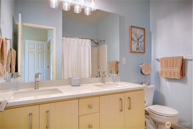 14721 1st Ln NE Unit 102, Duvall, WA 98019 - full bath with toilet, double vanity, and a shower with shower curtain