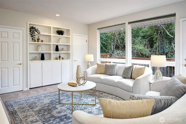 living room featuring carpet and recessed lighting