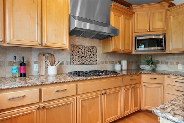 11758 175th Pl NE, Redmond, WA 98052 - kitchen featuring wall chimney range hood, appliances with stainless steel finishes, light stone counters, and tasteful backsplash