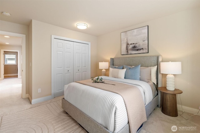 11758 175th Pl NE, Redmond, WA 98052 - bedroom with light colored carpet, baseboards, and a closet
