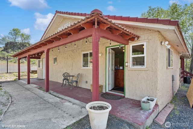 21058 State Highway 17 N, Soap Lake, WA 98851 - back of house featuring stucco siding, a patio, and a tiled roof
