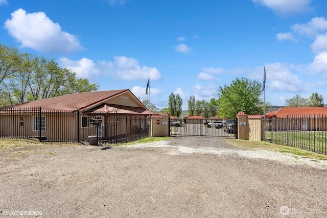 21058 State Highway 17 N, Soap Lake, WA 98851 - view of front of property with a gate and a tile roof
