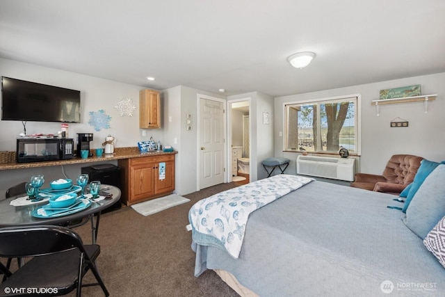 21058 State Highway 17 N, Soap Lake, WA 98851 - bedroom with a wall unit AC, dark colored carpet, and ensuite bathroom