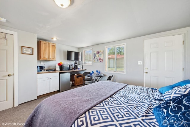 21058 State Highway 17 N, Soap Lake, WA 98851 - carpeted bedroom featuring refrigerator and a sink