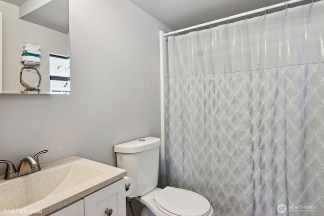 21058 State Highway 17 N, Soap Lake, WA 98851 - bathroom featuring vanity, toilet, and curtained shower