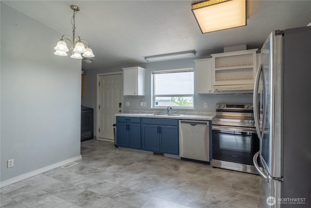 kitchen with stainless steel appliances, a sink, blue cabinets, under cabinet range hood, and light countertops