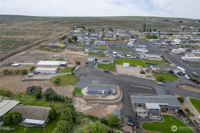 view of property location featuring nearby suburban area