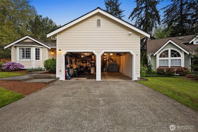 garage featuring driveway