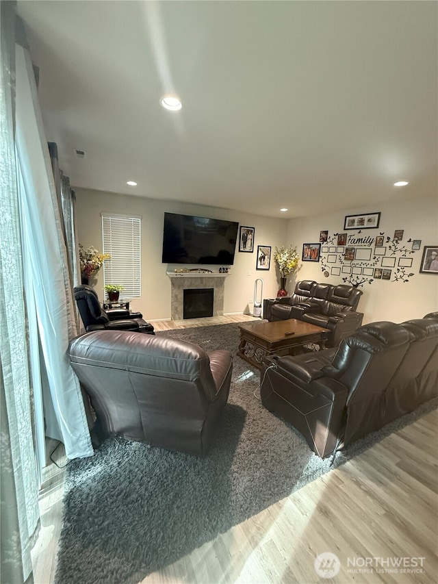 17510 80th Avenue Ct E, Puyallup, WA 98375 - living room featuring recessed lighting, a high end fireplace, and wood finished floors