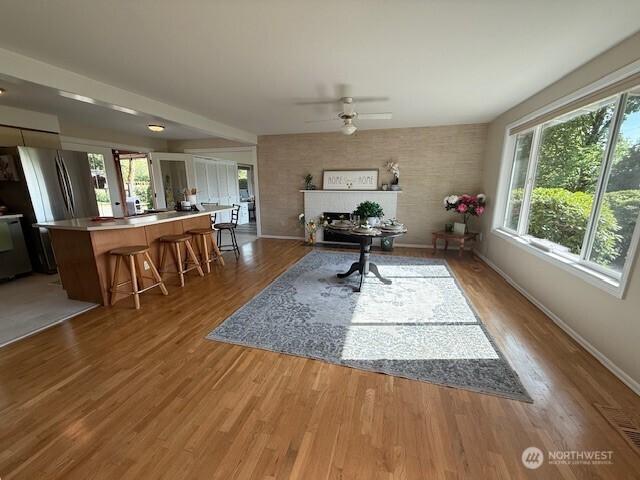 39418 200th Ave SE, Auburn, WA 98092 - living area with baseboards, wood finished floors, and a ceiling fan