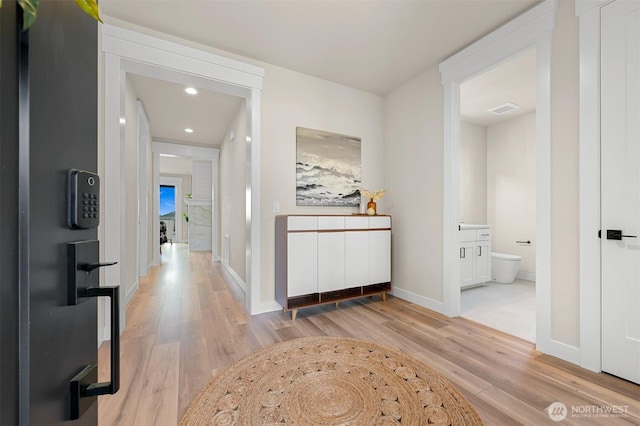 5411 Lonicera Dr, Blaine, WA 98230 - corridor with light wood finished floors, baseboards, and recessed lighting