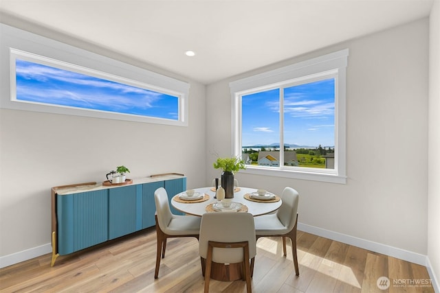 5411 Lonicera Dr, Blaine, WA 98230 - dining space featuring baseboards, light wood finished floors, and recessed lighting