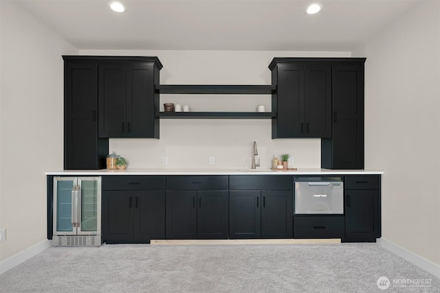 5411 Lonicera Dr, Blaine, WA 98230 - kitchen with beverage cooler, open shelves, dishwasher, carpet, and recessed lighting