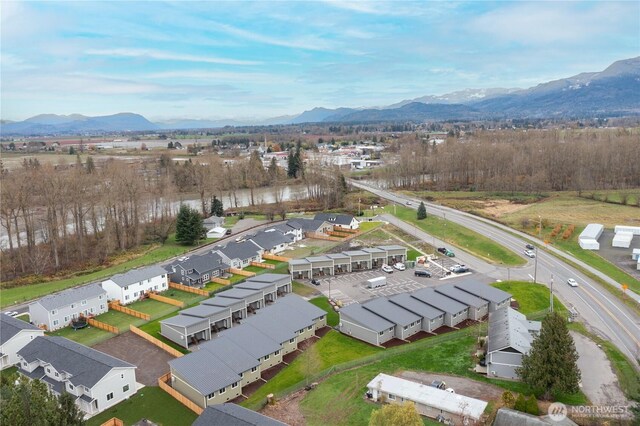 bird's eye view of a water and mountain view