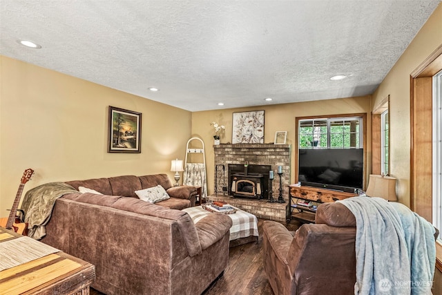 161 Mill Creek Rd, Longview, WA 98632 - living area with a textured ceiling, recessed lighting, wood finished floors, and a wood stove