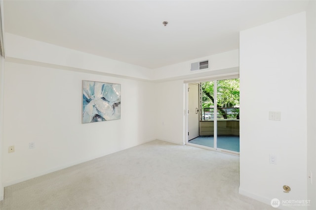 1750 152nd Ave NE Unit W110, Bellevue, WA 98007 - unfurnished room featuring light carpet and a pendent fire sprinkler