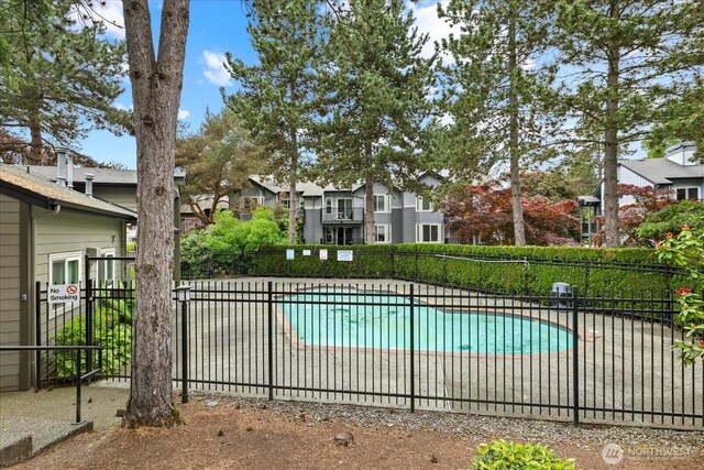 11109 NE 124th Ln Unit B106, Kirkland, WA 98034 - community pool featuring fence