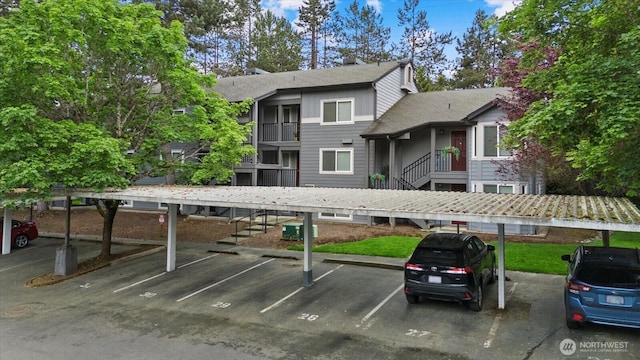 11109 NE 124th Ln Unit B106, Kirkland, WA 98034 - covered parking lot featuring stairway