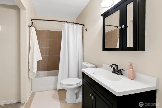 bathroom with toilet, vanity, and shower / tub combo with curtain