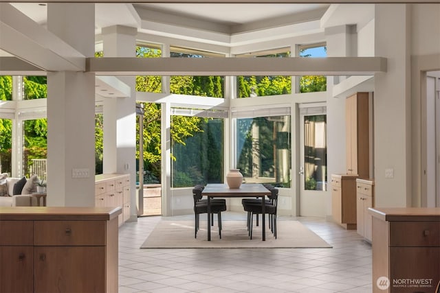 sunroom featuring french doors