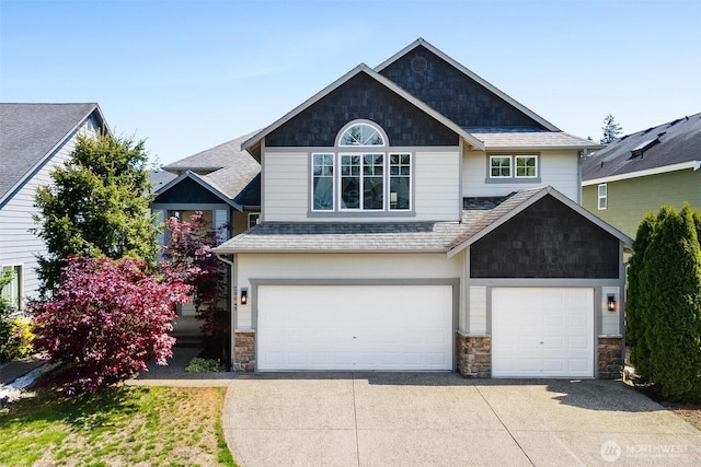 craftsman-style home featuring an attached garage, stone siding, driveway, and roof with shingles
