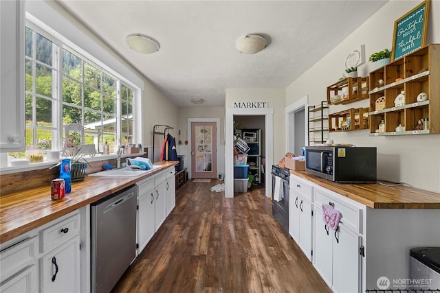 121 Temple Rd, Morton, WA 98356 - kitchen with butcher block counters, appliances with stainless steel finishes, a sink, and dark wood-style flooring