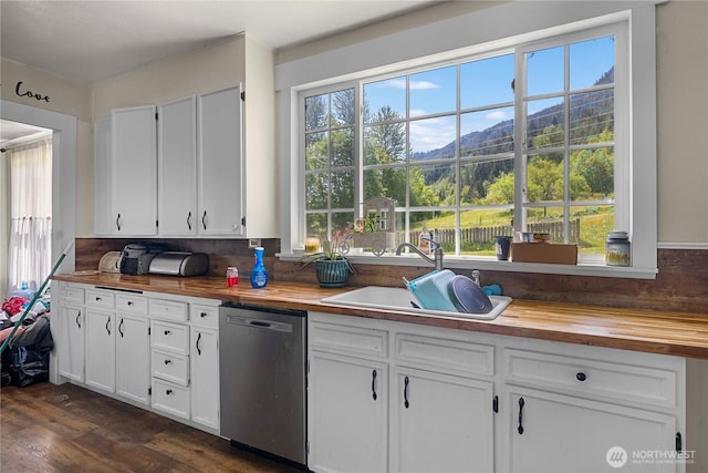 121 Temple Rd, Morton, WA 98356 - kitchen featuring butcher block counters, stainless steel dishwasher, a sink, and a mountain view