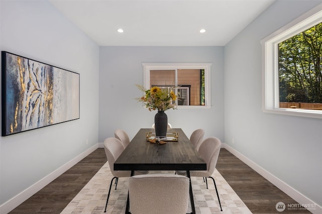 dining room featuring recessed lighting, baseboards, and dark wood finished floors