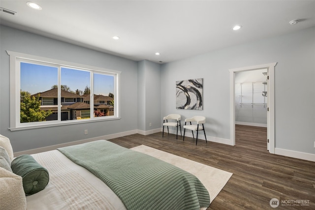 bedroom with wood finished floors, baseboards, and recessed lighting